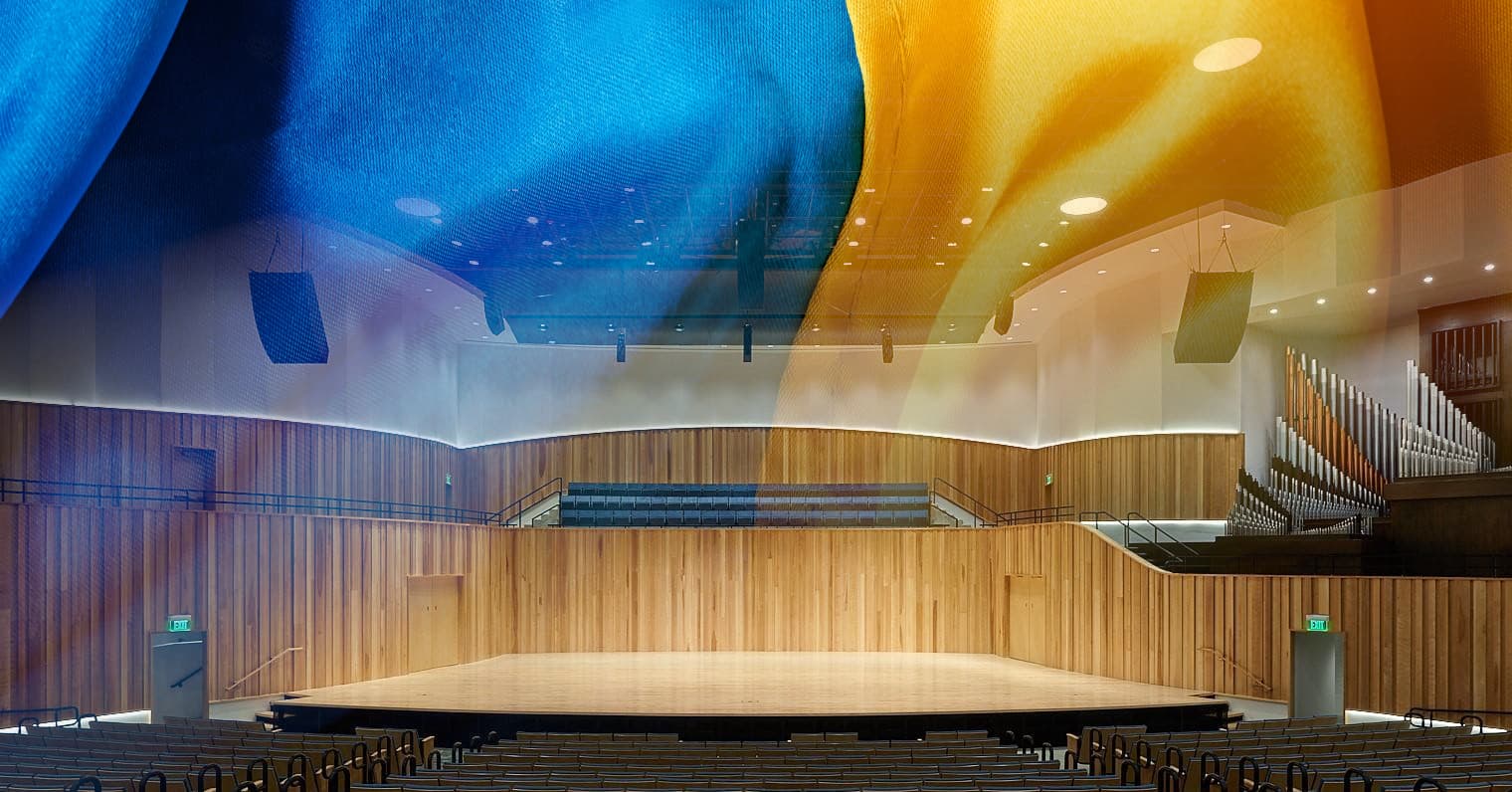 A view from the seating area toward the stage of the Daines Concert Hall